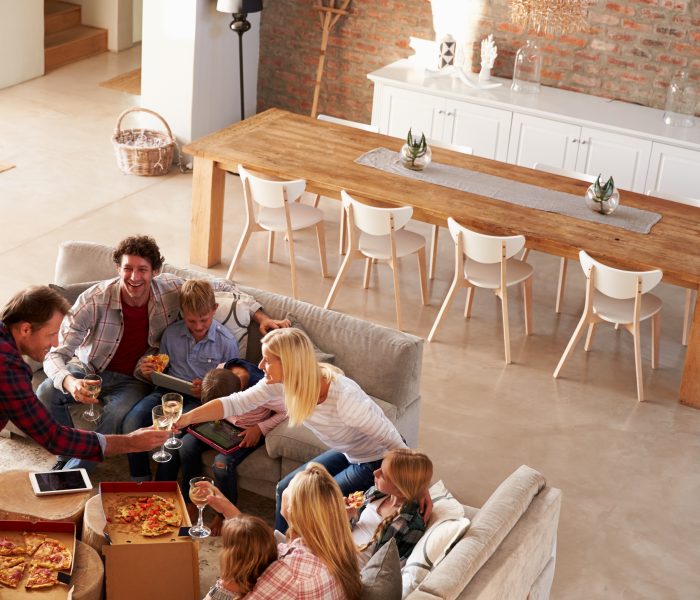 Two families spending time together at home